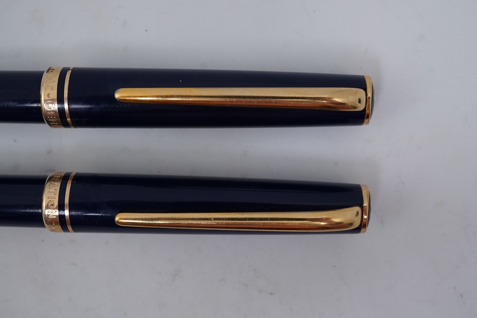 A Montblanc Generation ballpoint pen and propelling pencil set in blue with gold trims